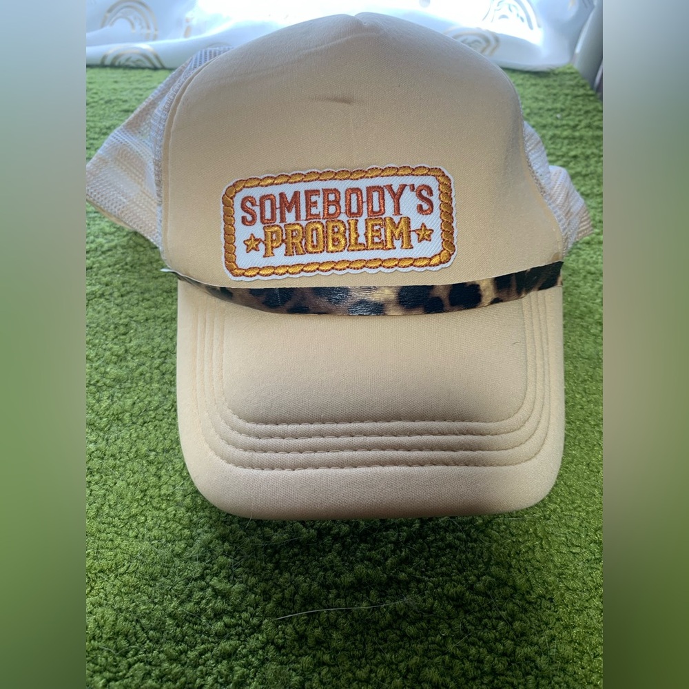 Women Beige 'Somebody's Problem' Trucker Hat with Leopard Accent